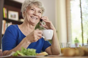 Stock image elderly person with phone 