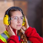 Young female construction worker